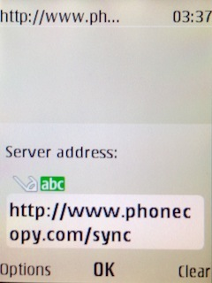 Napište http://www.phonecopy.com/sync into the server address field