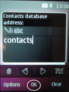 Vyberte Contact database a napište Contacts.